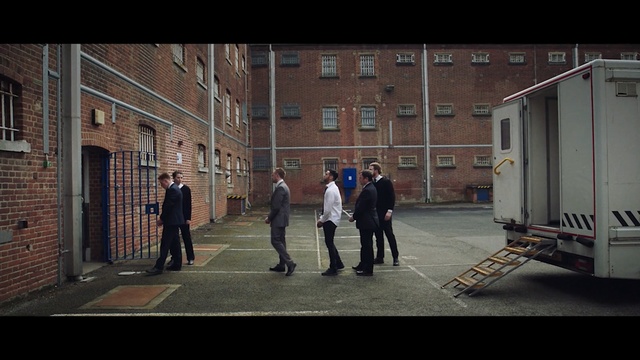 Video Reference: urban area, infrastructure, town, street, road, car, city, vehicle, building, house, Person