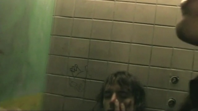 Video Reference: hair, green, black, photograph, mammal, wall, room, mode of transport, snapshot, floor