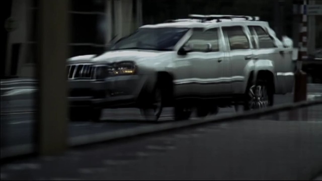 Video Reference: car, land vehicle, vehicle, mode of transport, jeep, sport utility vehicle, automotive tire, rim, bumper, vehicle registration plate