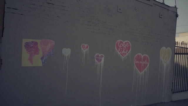 Video Reference: wall, purple, art, mural, street art, area, graffiti, visual arts, space