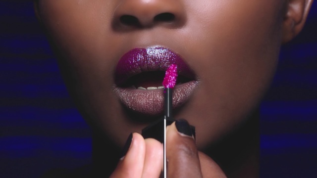 Video Reference: Lip, Beauty, Cheek, Purple, Lip gloss, Pink, Nose, Glitter, Violet, Close-up