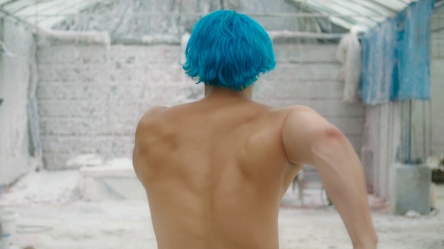 Video Reference: Barechested, Shoulder, Male, Muscle, Chest, Joint, Arm, Back, Turquoise, Neck, Person, Outdoor, Building, Looking, Holding, Young, Water, Walking, Blue, Boy, Standing, Woman, Man, White, Phone, Talking, Mouth, Beach, Board, Tub, Playing, Hat, Underpants