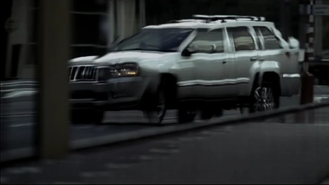 Video Reference: car, land vehicle, vehicle, mode of transport, jeep, sport utility vehicle, vehicle registration plate, parking, automotive tire, bumper