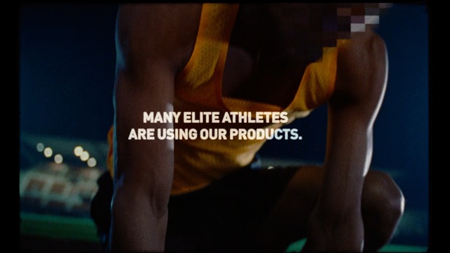 Video Reference: Thigh, Arm, Leg, Muscle, Joint, Human body, Human leg, Font, Chest, Photography, Person, Indoor, Table, Holding, Sitting, Front, Monitor, Man, Black, Feet, Screen, Woman, Standing, White, Board, Blue, Player, Pizza, Screenshot, Text