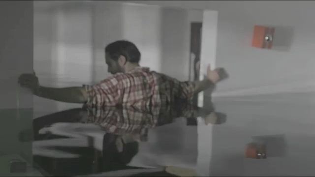 Video Reference: mode of transport, room, lighting, glass, interior design, facial hair, material, shooting range, window, floor