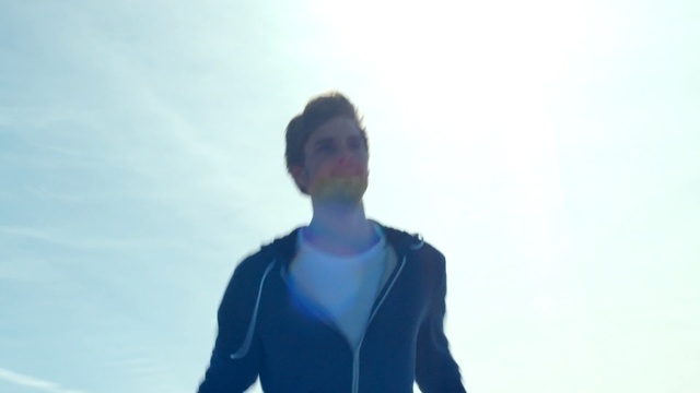 Video Reference: Blue, Wetsuit, White, Shoulder, Photograph, Standing, Cobalt blue, Personal protective equipment, Electric blue, Joint, Person