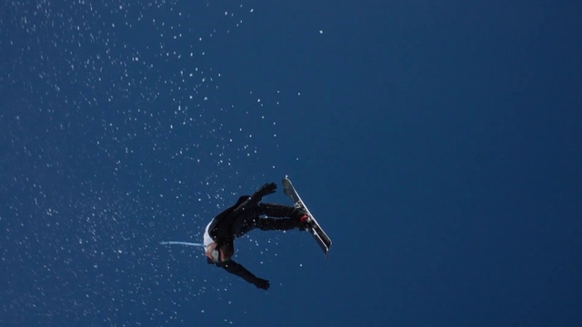 Video Reference: Freestyle skiing, Sky, Flip (acrobatic), Recreation, Space, Extreme sport, Ski jumping