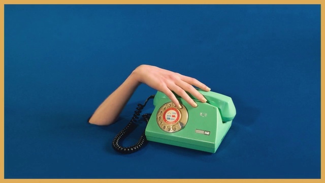 Video Reference: Green, Bag, Hand, Handbag, Fashion accessory, Person, Woman, Water, Yellow, Sitting, Table, Racket, Holding, Blue, Ball, Young, Court, Playing, Red, Player, Swinging, White, Sign, Text