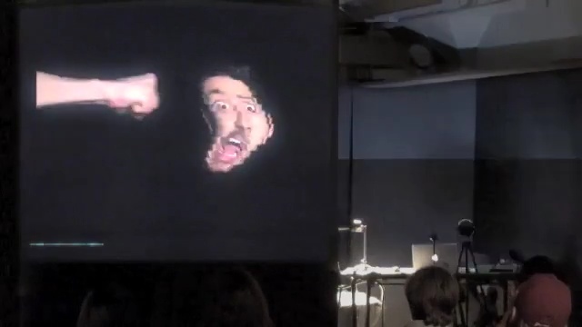 Video Reference: entertainment, performance art, performance, event, display device, electronic device, technology, performing arts, darkness, stage, Person