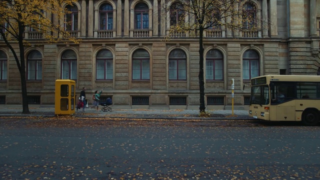 Video Reference: Transport, Yellow, Mode of transport, Architecture, Urban area, Building, Vehicle, Facade, City, Street