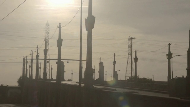 Video Reference: Overhead power line, Atmospheric phenomenon, Electricity, Sky, Atmosphere, Morning, Haze, Pollution, Public utility, Electrical supply