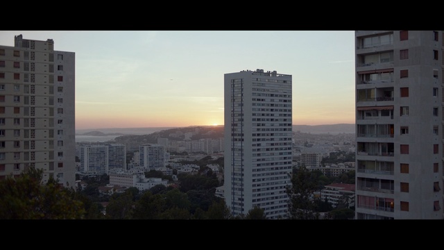 Video Reference: Sky, Metropolitan area, Urban area, City, Tower block, Metropolis, Daytime, Skyscraper, Human settlement, Cityscape, Person