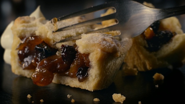 Video Reference: mince pie, cherry pie, food, dessert, dish, treacle tart, blueberry pie, baking, baked goods, Person