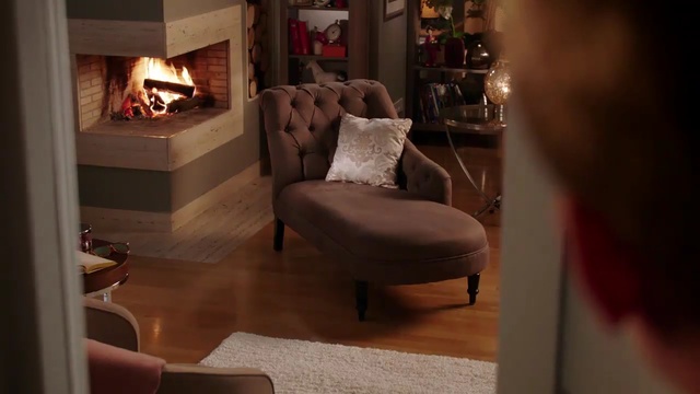 Video Reference: Room, Fireplace, Living room, Furniture, Hearth, Interior design, Property, Lighting, Heat, Floor, Person