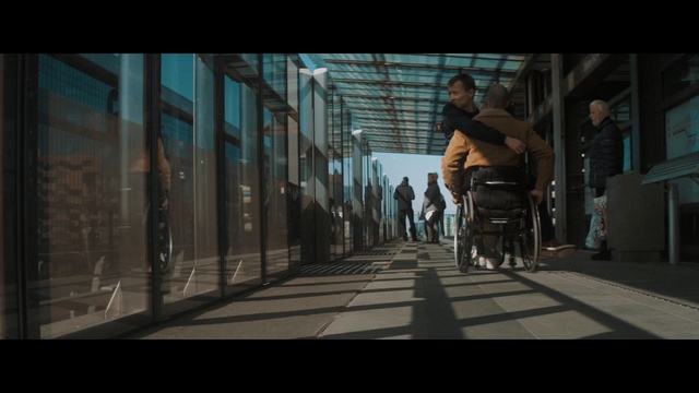 Video Reference: urban area, mode of transport, infrastructure, street, snapshot, screenshot, road, sky, city, pedestrian