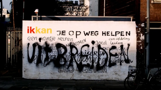 Video Reference: advertising, poster, wall, street art, street, art, graffiti, road, font, mural, Person