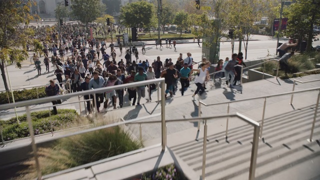 Video Reference: Public space, Pedestrian, Crowd, City, Metropolitan area, Urban design, Tree, Plaza, Recreation, Building