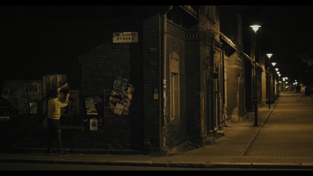 Video Reference: Black, Darkness, Night, Light, Urban area, Town, Street, Metropolitan area, Midnight, Infrastructure