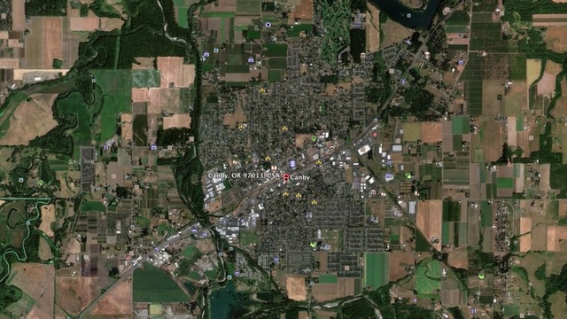 Video Reference: suburb, urban area, residential area, aerial photography, city, bird's eye view, metropolitan area, neighbourhood, tree, urban design