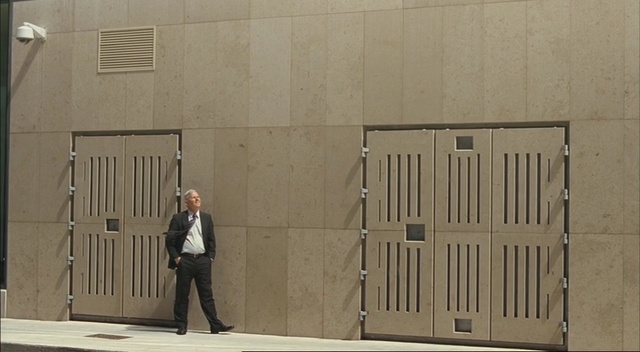 Video Reference: wall, architecture, door, facade, building, floor, window, Person