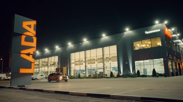 Video Reference: Building, Architecture, Metropolitan area, Night, Filling station, Commercial building, Facade