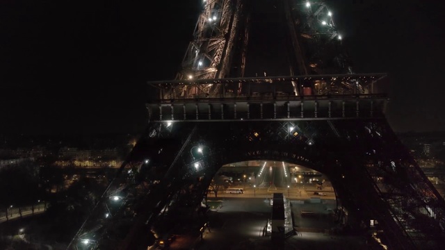 Video Reference: Night, Sky, Vehicle, Midnight, Luxury vehicle, Architecture, Darkness, City, Mid-size car, Car, Outdoor, Building, Water, Large, Going, Light, Street, Bridge, Snow, View, Dark, Lit, Traveling, Driving, Standing, Clock, Traffic, Tall, Boat, Tower, Train, Room, Man, Skyscraper, Ship