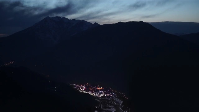 Video Reference: sky, mountain, mountainous landforms, atmosphere, mountain range, geological phenomenon, cloud, highland, ridge, mount scenery