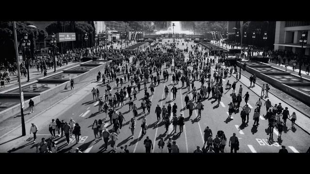 Video Reference: Crowd, People, Black-and-white, Street, Urban area, Monochrome, Metropolitan area, Pedestrian, Infrastructure, Photography