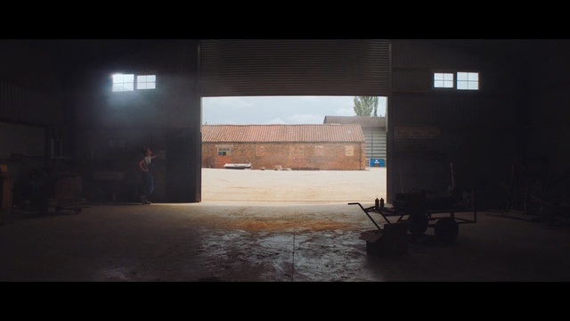 Video Reference: darkness, light, architecture, urban area, structure, wall, morning, atmosphere, sunlight, sky, Person