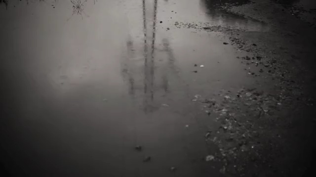 Video Reference: Water, Black, Atmospheric phenomenon, Atmosphere, Rain, Darkness, Monochrome photography, Black-and-white, Drizzle, Reflection, Person