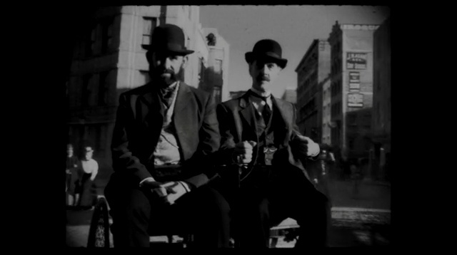 Video Reference: black, photograph, black and white, man, monochrome photography, social group, darkness, mode of transport, gentleman, photography, Person