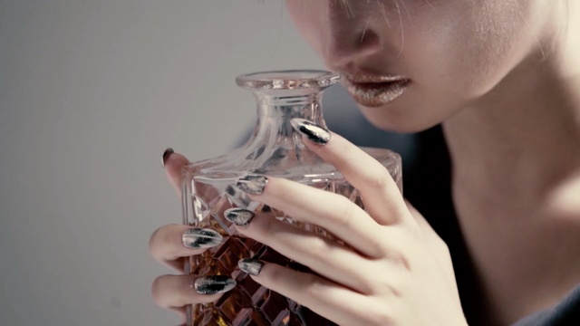 Video Reference: nail, water, hand, jewellery, finger, lip, eyelash, neck, stemware, drink