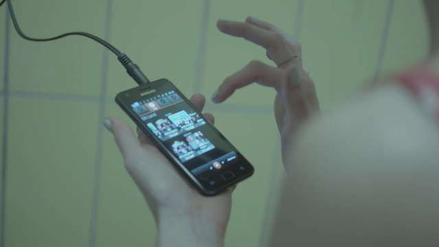 Video Reference: mobile phone, gadget, technology, electronic device, communication device, cellular network, feature phone, electronics, portable communications device, finger