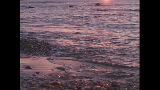 Video Reference: sea, body of water, shore, horizon, wave, water, ocean, sky, atmosphere, sunrise