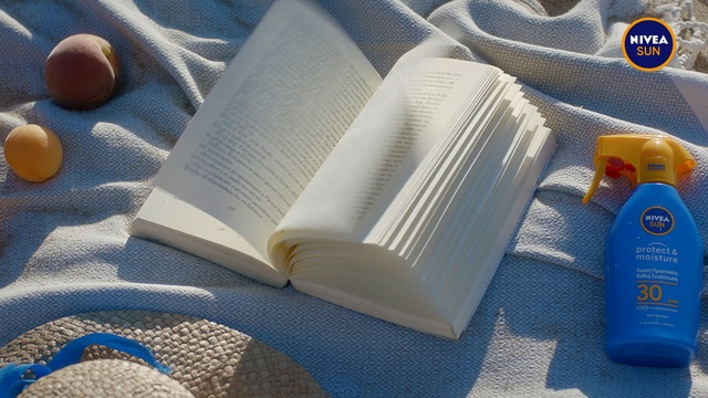 Video Reference: Plastic, Table, Indoor, Cup, Sitting, Food, Paper, Bag, Cellphone, Topped, Small, Phone, Laying, Plate, Book, Design, Cloth