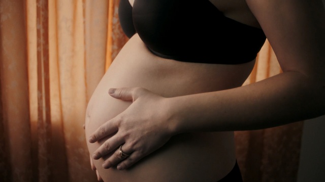 Video Reference: Skin, Abdomen, Stomach, Mother, Hand, Trunk, Organ, Joint, Close-up, Arm