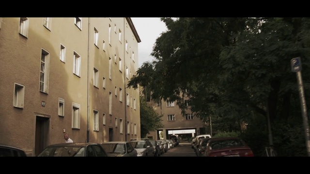Video Reference: Neighbourhood, Town, Residential area, Urban area, Sky, Architecture, Human settlement, Mode of transport, Snapshot, Tree