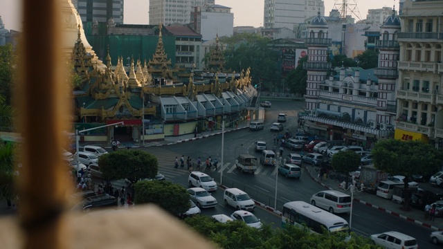 Video Reference: city, urban area, metropolitan area, metropolis, downtown, car, cityscape, tree, traffic, neighbourhood, Person