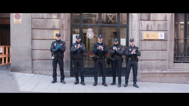 Video Reference: Official, Uniform, Police, Security, Police officer, Standing, Military uniform, Headgear, Security guard, Event