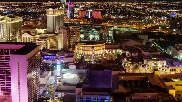 Video Reference: Cityscape, Metropolitan area, City, Metropolis, Urban area, Human settlement, Building, Night, Downtown, Mixed-use