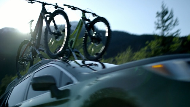 Video Reference: Vehicle, Motor vehicle, Automotive exterior, Automotive carrying rack, Roof rack, Bicycle, Automotive bicycle rack, Mode of transport, Auto part, Mountain bike