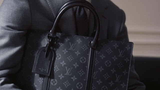 Video Reference: Bag, Black, Handbag, Fashion accessory, Leather, Material property, Diaper bag, Shoulder bag, Luggage and bags, Baggage