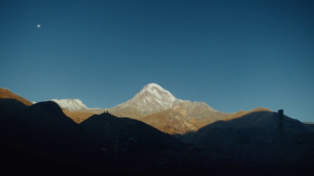 Video Reference: Mountainous landforms, Mountain, Sky, Mountain range, Blue, Highland, Ridge, Cloud, Wilderness, Alps