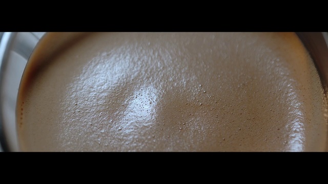 Video Reference: Skin, Eyebrow, Brown, Tan, Close-up, Beige, Material property, Powder