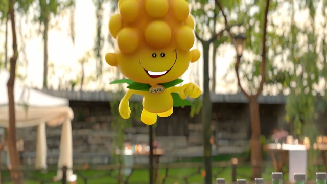 Video Reference: yellow, toy, plant, grass, tree, Person