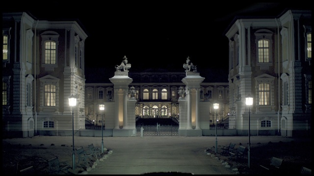 Video Reference: Landmark, Building, Architecture, Light, Night, Lighting, Mansion, Darkness, Classical architecture, Facade, Person