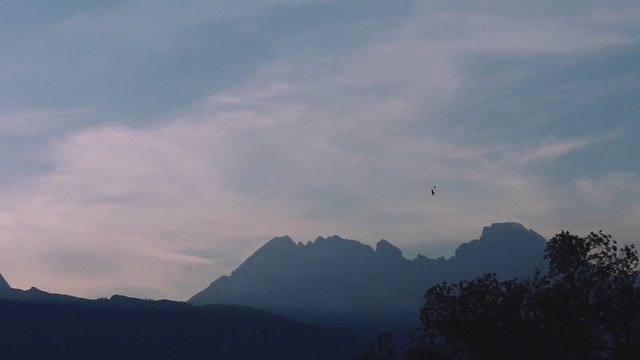 Video Reference: Sky, Cloud, Mountainous landforms, Mountain, Atmospheric phenomenon, Mountain range, Atmosphere, Evening, Cumulus, Hill station