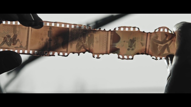 Video Reference: Photograph, Brown, Font, Iron, Wood, Eyewear, Stock photography, Metal, Fashion accessory, Leather