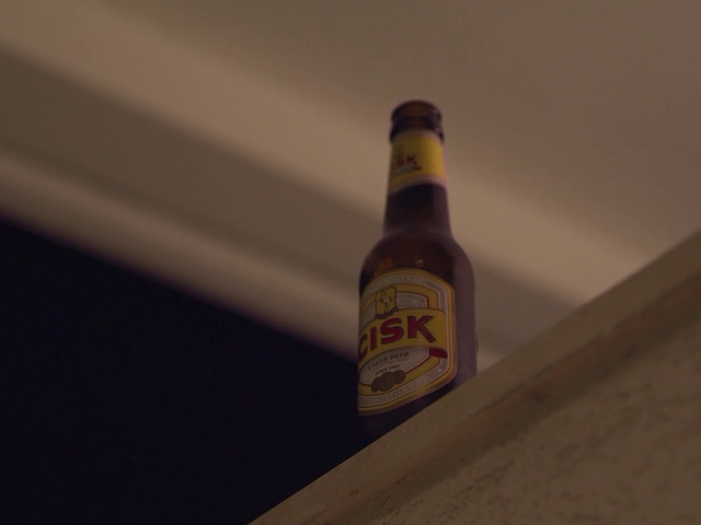 Video Reference: Bottle, Glass bottle, Beer bottle, Liqueur, Drink, Alcohol, Beer, Alcoholic beverage, Distilled beverage, Wood