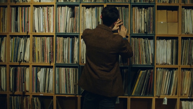 Video Reference: library, bookselling, human behavior, librarian, public library, bookcase, shelving, book, window, archivist, Person